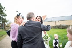 Bride receiving congratulations from their guests