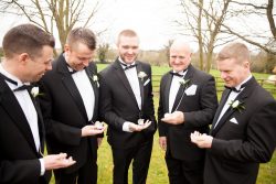 The groom and his groomsmen with their gifts